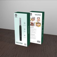 Green earwax removal tool